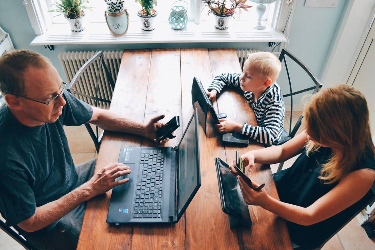 Family On Laptops